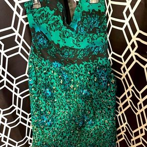 EUC strapless dress. Scalloped top, green, blue, gold leopard pattern. Size L.